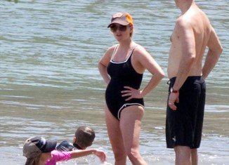 Reese Witherspoon revealed her baby bump when she was spotted enjoyed a sun-soaked holiday to Costa Rica with her family