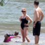 Reese Witherspoon reveals her baby bump while enjoying holiday to Costa Rica with her family