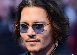 At the premiere of Dark Shadows in London Johnny Depp denied that his relationship with Vanessa Paradis is in trouble