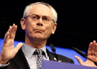 European Council President Herman Van Rompuy has announced that EU leaders want Greece to remain in the eurozone but to "respect its commitments"