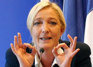 Marine Le Pen told a rally of her National Front party that she could back neither incumbent Nicolas Sarkozy nor Socialist Francois Hollande and told supporters to follow their conscience