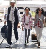 Mere days after laughing off reports that Will Smith and wife Jada Pinkett are splitting up, they made a show of family support by turning up at LAX together yesterday with daughter Willow in tow