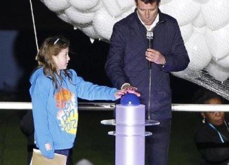 Niamh Clarke-Willis joined LOCOG head Lord Sebastian Coe to hit a button which launched balloons into the sky above London Olympic Stadium for this summer's Games