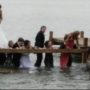 Prom dates plunge into lake while taking photos after pier collapsed