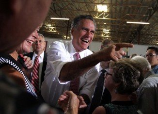 Republican Mitt Romney has secured his place as the challenger to Barack Obama in November's US presidential election, following a primary in Texas