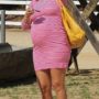 Heavily pregnant Kourtney Kardashian wearing curve-hugging mini dress