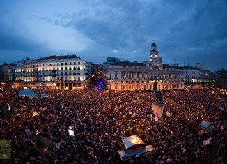 Tens of thousands of people have protested in capital Madrid and in a number of Spanish cities to mark the first anniversary of the "Indignants" movement