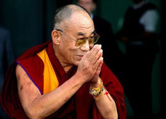 The Dalai Lama says he will give away to charity $1.7 million Templeton Prize money awarded to him
