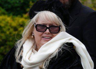 Dwina Gibb, the widow of late Bee Gees star Robin Gibb, read a heartfelt poem she had written for her husband at his funeral service