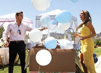 Giuliana and Bill Rancic used a creative way to let their friends know they were expecting a son at their guessing-themed Beverly Hills bash over the weekend
