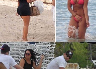 Kris Humphries has been spotted on a lounger in Miami Beach with his rumored new flame, a woman who had long black hair and an hour-glass figure