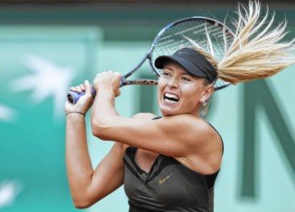 Maria Sharapova blasted her way to victory over Italian Sara Errani in the French Open final to become only the 10th woman to complete a career Grand Slam
