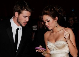 Miley Cyrus announces that she is engaged to The Hunger Games actor Liam Hemsworth