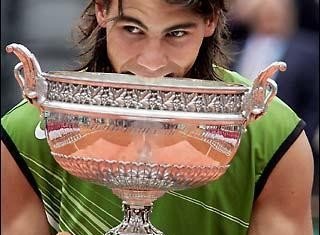 Rafael Nadal won a record seventh French Open title after beating Novak Djokovic with in a rain-affected final