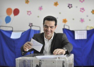Right-wing New Democracy and left-wing Syriza parties are almost neck-and-neck after Greek parliamentary elections, according to the first exit polls