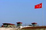 Turkey begins rocket launchers and anti-aircraft guns deployment along its border with Syria after last week's downing of a fighter jet