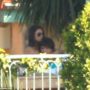 Ashton Kutcher and Mila Kunis spotted openly kissing and cuddling