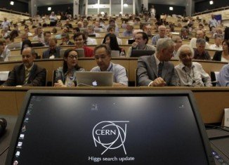 CERN scientists reporting at conferences in the UK and Geneva claim the discovery of a new particle consistent with the Higgs boson