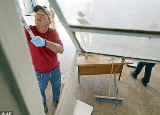 George Bush during his mission to renovate a women's cancer screening center in Zambia