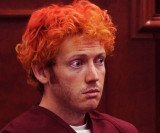James Holmes, the suspect gunman at Aurora cinema, has been formally charged with 142 criminal counts in one of America's worst mass shootings