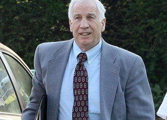 Jerry Sandusky allegedly called the boy he was seen raping in a locker room shower and left him two sickening voicemail messages professing his love