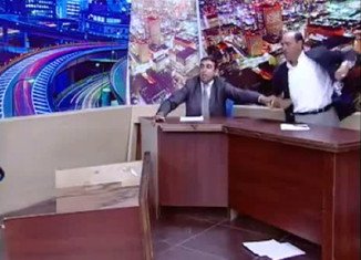 Jordanian MP Mohammad Shawabka threw one of his shoes at political opponent Mansour Sayf al-Din Murad during a television debate before pulling a gun on him