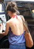 Katie Holmes failed to hide her shrinking frame when she spent the day with her daughter Suri