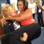 Michelle Obama picked up by Olympic wrestler Elena Pirozhkova at Team USA meeting