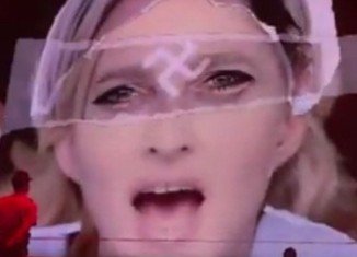 National Front is to sue Madonna after showing Marine Le Pen with a swastika during her concert in Paris
