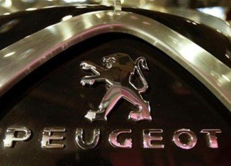 Peugeot has reported a loss of 819 million Euros ($1 billion) for the first half of the year