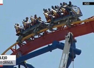 The two dozen men and women found themselves stranded 150 feet above ground for nearly two hours when both the cars of The Superman Ultimate Flight ride stalled atop the track