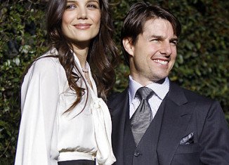 Tom Cruise and Katie Holmes have reached an agreement to settle their divorce
