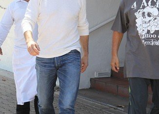 Tom Cruise appeared unconcerned as he emerged after lunch at Tony’s Tavern in Malibu and even sported a huge smile as he walked along