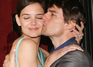 Tom Cruise's lawyers have taken at a swipe at Katie Holmes, accusing her and her legal team of “playing the media
