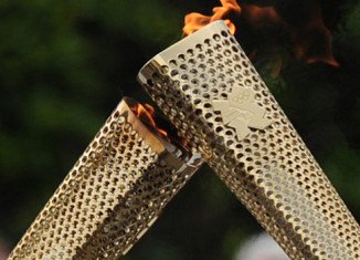 Triple jumper Phillips Idowu, former gymnast Nadia Comaneci and ex-basketball star John Amaechi will carry the flame on day 64 of the torch relay