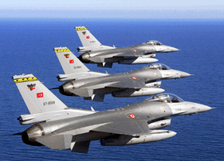 Turkish army has scrambled six F-16 fighter jets near its border with Syria after Syrian helicopters came close to the border