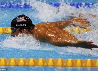 An era of unprecedented sporting domination came to an end at the London Olympics today, with a stunning victory for Michael Phelps in his last competitive race