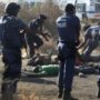 Lonmin Marikana platinum mine clashes kill at least 30 people