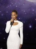 Beyoncé's new video shows the 30-year-old singer slipping into a gorgeous white sequinned gown to perform her 2011 track I Was Here for World Humanitarian Day