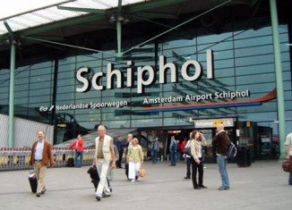 Certain areas of Amsterdam's Schiphol airport have been closed after a suspected World War II bomb was discovered