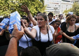 Far-right Golden Dawn party has handed out free food to hundreds of struggling people in central Athens, but only to Greek nationals