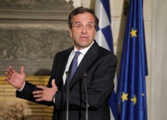 Greece’s Prime Minister Antonis Samaras is expected to repeat his plea for more time to implement reforms when he meets French President Francois Hollande