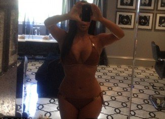 Kim Kardashian revealed her diet secrets as she shared another picture of herself in a bikini on her Twitter page
