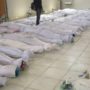 Syrian opposition say scores of bodies have been found near Damascus