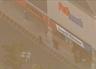 Three people have been shot dead after a gunman walked into a New Jersey Pathmark store and killed two staff members including an 18-year-old girl