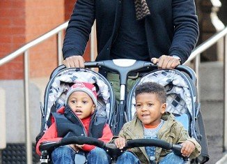 Usher was awarded primary care of 4-year-old Usher Raymond V and Naviyd, 3, after a ruling by Georgia judge