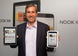 Barnes and Noble CEO William Lynch unveils the new NOOK HD plus, left, and NOOK HD in New York