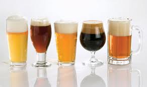 British researchers at the University of Bristol believe the shape of beer glasses affects the speed people drink
