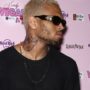 Chris Brown unveils new tattoo of a woman’s battered and bruised face