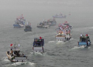 Dozens of Taiwanese boats sailed to disputed East China Sea islands in a brief protest